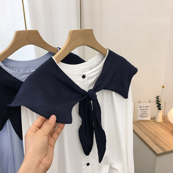 Uue mudeli ümara kaelusega ja pikkade varrukatega naiste särk