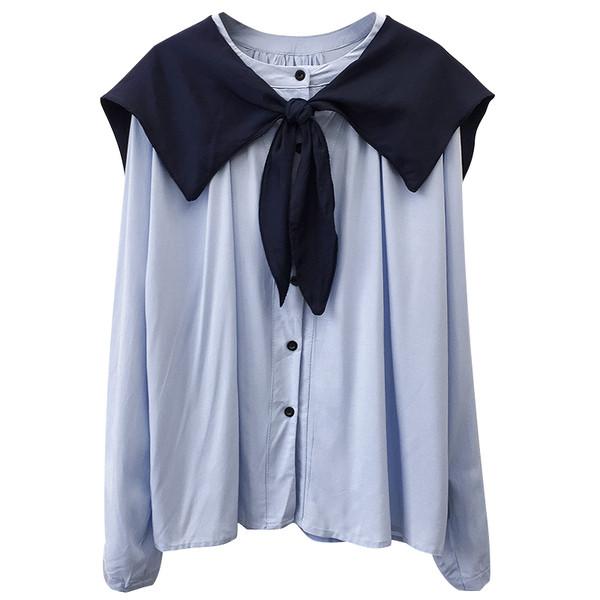 Uue mudeli ümara kaelusega ja pikkade varrukatega naiste särk