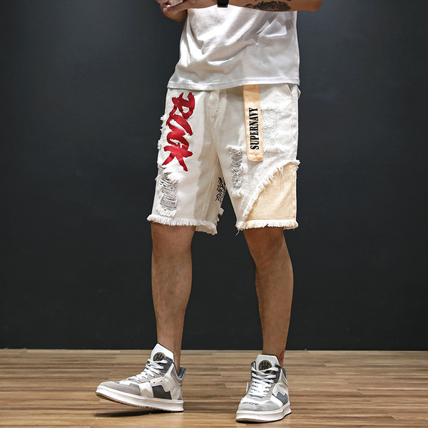 Καλοκαιρινά τζιν με μήκος 3/4 με σκισμένα μοτίβα