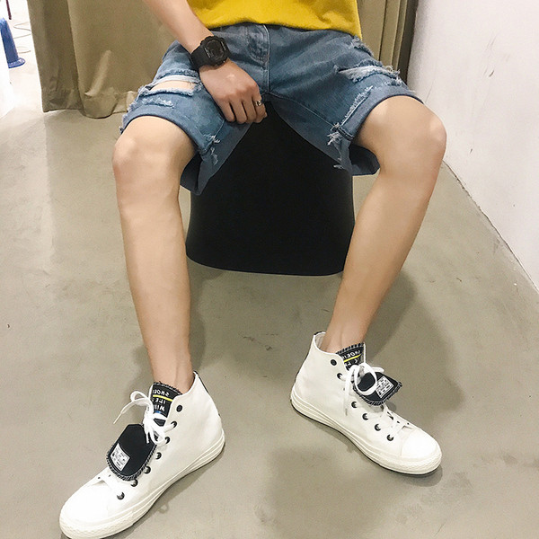 Vasaras 3/4 džinsi ar saplēstiem motīviem