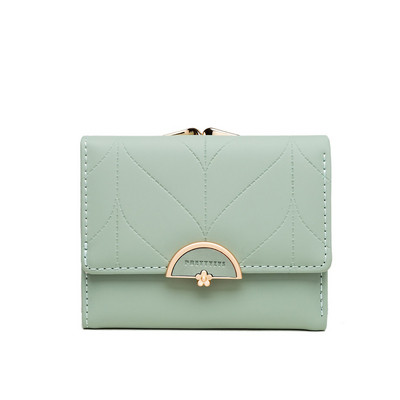 Γυναικείο πορτοφόλι με μεταλλική στερέωση από οικολογικό δέρμα