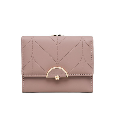 Γυναικείο πορτοφόλι με μεταλλική στερέωση από οικολογικό δέρμα