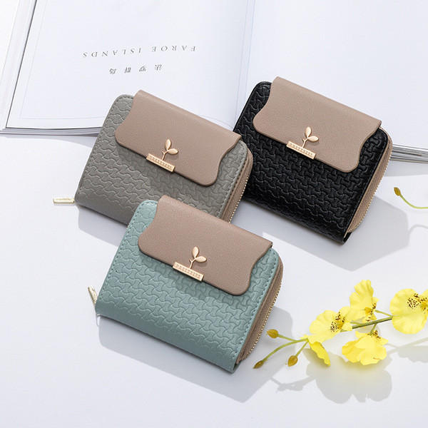 Kis női pénztárca fém elemmel és érme zsebbel