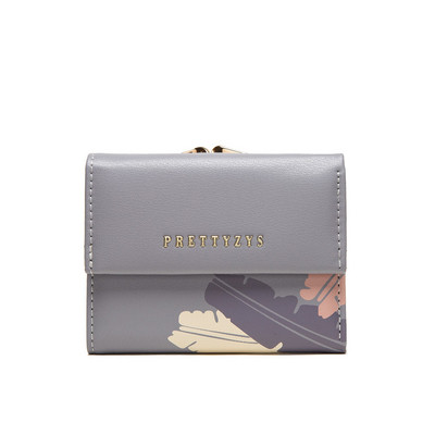 Γυναικείο μικρό πορτοφόλι με μεταλλικό κούμπωμα και τσέπη με κέρματα