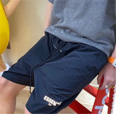 Meeste vabaaja lühikesed püksid elastse vöökoha ja neljas värvitoonis tekstiga