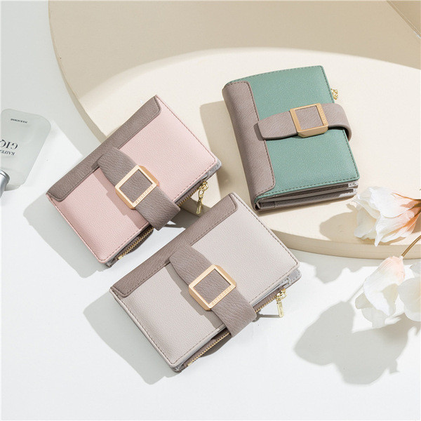 Kis női pénztárca fém rögzítéssel