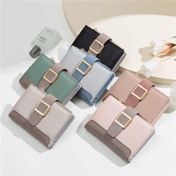 Kis női pénztárca fém rögzítéssel