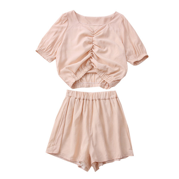 Naiste spordikomplekt kaheosalisest pluusist + lühikesed püksid