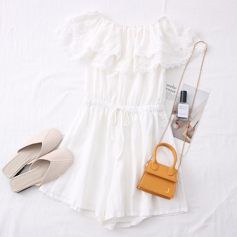 Alkalmi női overall csónakos nyakkivágással és csipkével