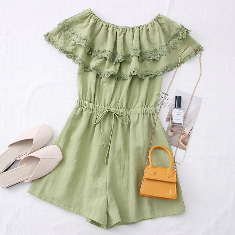 Alkalmi női overall csónakos nyakkivágással és csipkével