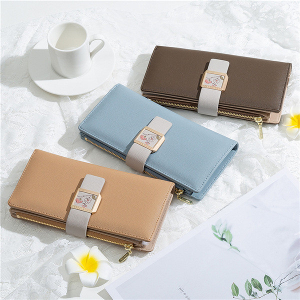 Női bőr pénztárca fém rögzítéssel