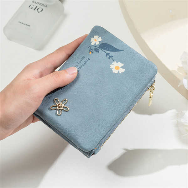 Γυναικείο πορτοφόλι με μεταλλικό λουλούδι και τσέπη για κέρματα