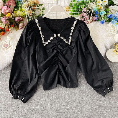 Naiste vabaaja lühike pikkade laiade varrukate ja kandilise kaelusega särk