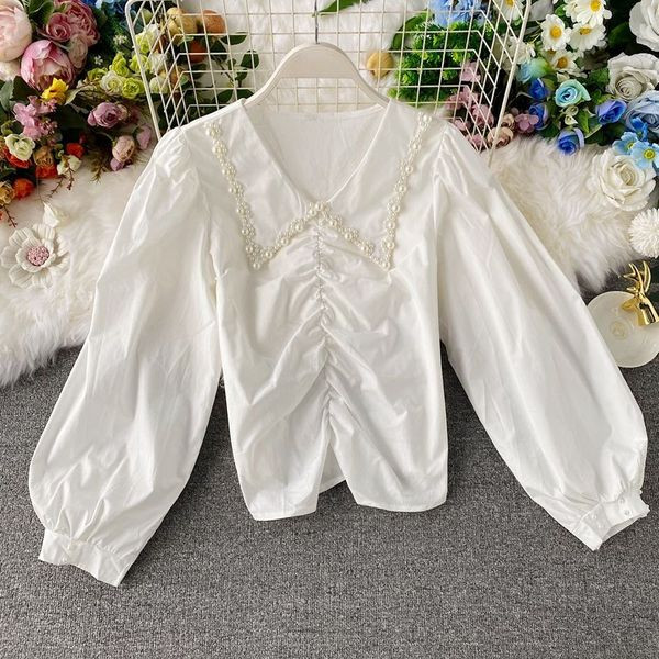 Naiste vabaaja lühike pikkade laiade varrukate ja kandilise kaelusega särk