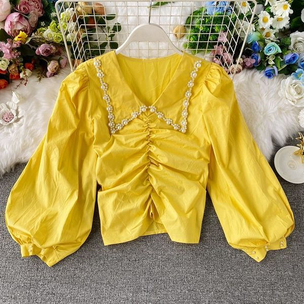 Naiste vabaaja lühike pikkade laiade varrukate ja kandilise kaelusega särk