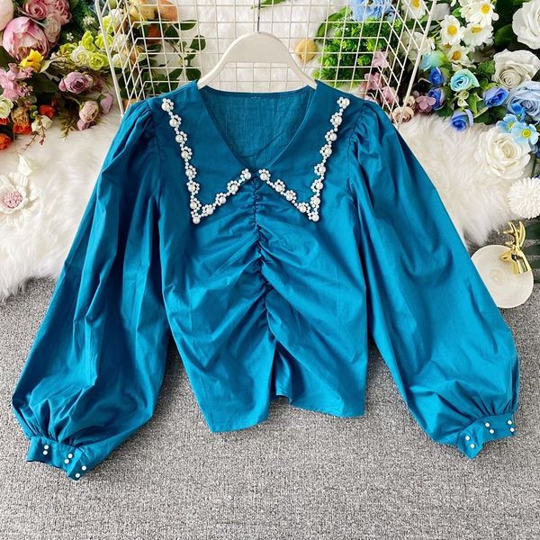 Naiste vabaaja lühike pikkade laiade varrukate ja kandilise kaelusega särk