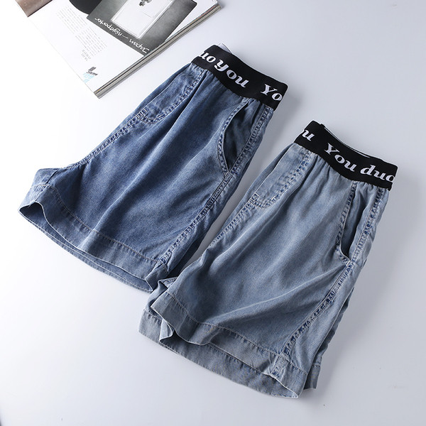 Naiste vabaaja püksid elastse vöökoha ja kirjaga