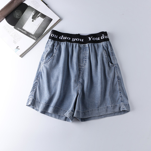 Naiste vabaaja püksid elastse vöökoha ja kirjaga