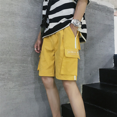 Nyári rövidnadrág oldalzsebekkel és hímzéssel