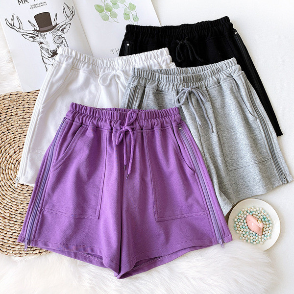 Sieviešu sporta šorti ar saitēm un kabatām