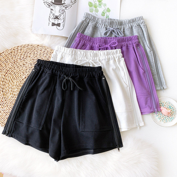 Sieviešu sporta šorti ar saitēm un kabatām