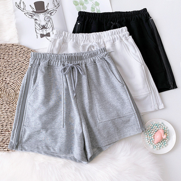 Sieviešu sporta šorti ar saitēm un kabatām