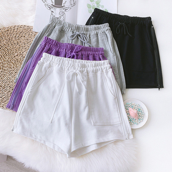 Sieviešu sporta šorti ar saitēm un kabatām