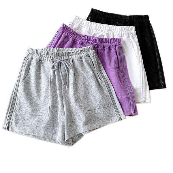 Sieviešu sporta šorti ar saitēm un kabatām