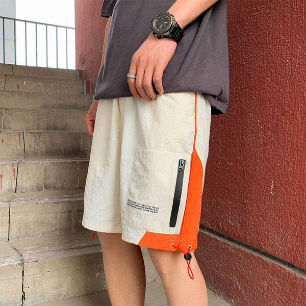 Lühikesed lukuga ja lipsudega lühikesed püksid