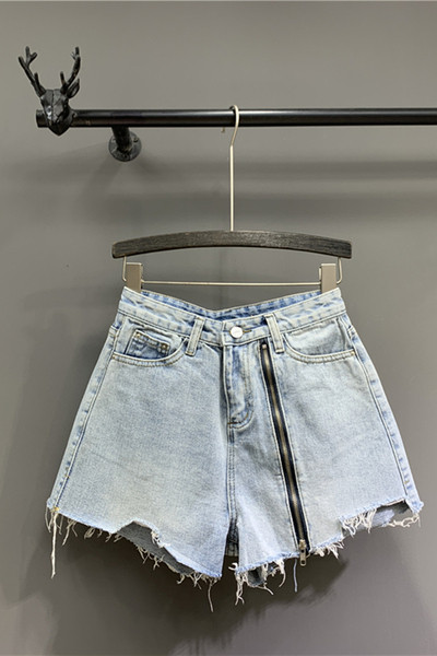 Női rövid farmer új modell cipzárral kék színben