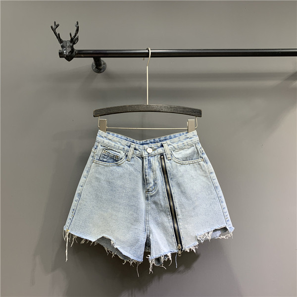 Női rövid farmer új modell cipzárral kék színben