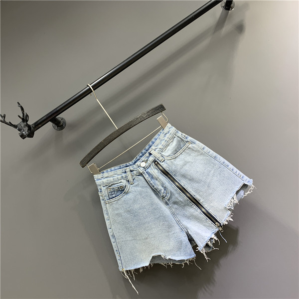 Női rövid farmer új modell cipzárral kék színben