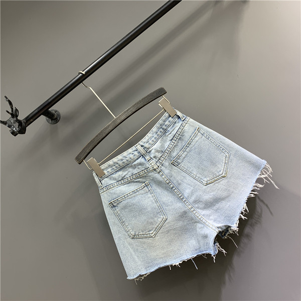 Női rövid farmer új modell cipzárral kék színben