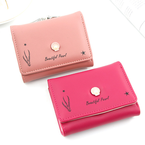 Naiste rahakott münditasku ja metallist kaunistusega