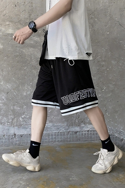 Laiad 3/4 lühikesed püksid kirjadega