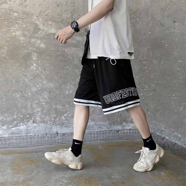 Laiad 3/4 lühikesed püksid kirjadega