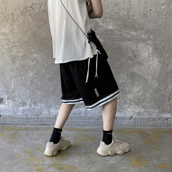 Laiad 3/4 lühikesed püksid kirjadega