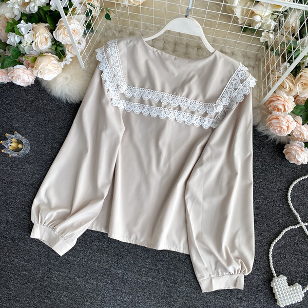 Moodne ümara dekoltee ja nööpidega naiste särk