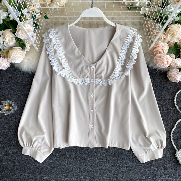 Moodne ümara dekoltee ja nööpidega naiste särk