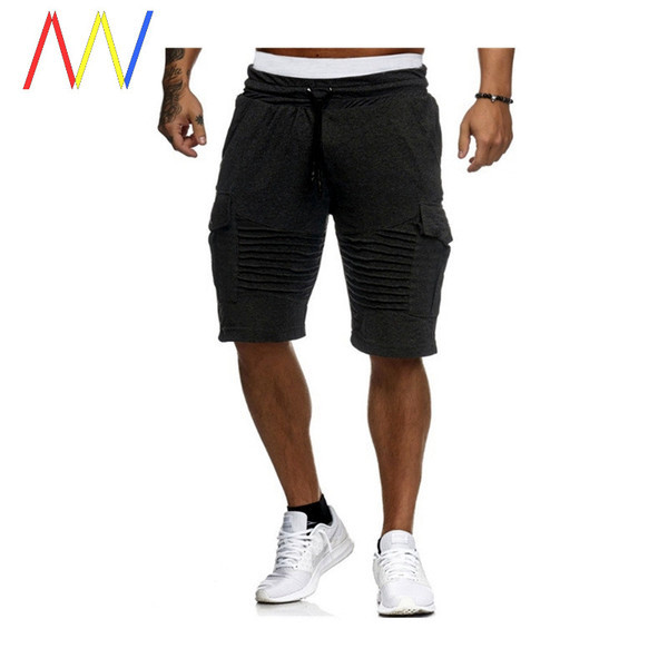 Meeste 3/4 puuvillased püksid küljetaskutega