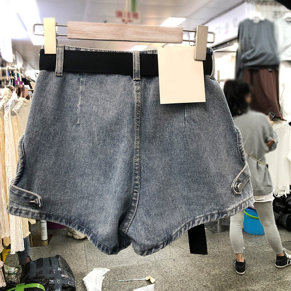 Naiste vöö ja metallelementidega teksapüksid