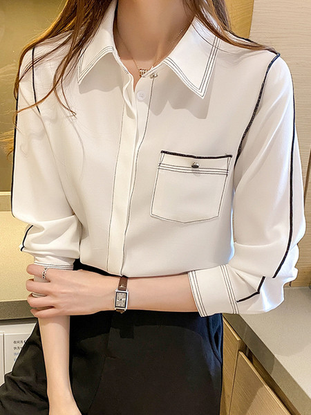 Klassikalise krae ja valge taskuga vabaaja naiste särk