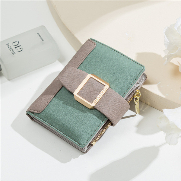 Kis női pénztárca fém rögzítéssel és cipzárral