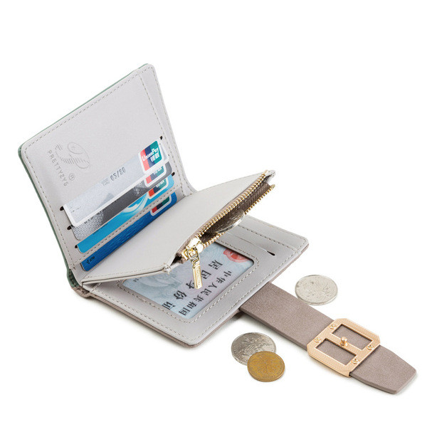 Kis női pénztárca fém rögzítéssel és cipzárral