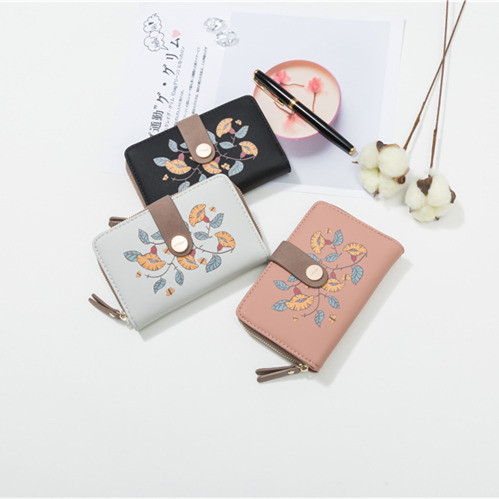 Naiste lillede ja lukuga nahast rahakott