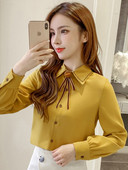 Alkalmi női ing szalaggal és klasszikus gallérral