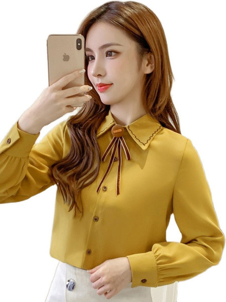 Alkalmi női ing szalaggal és klasszikus gallérral