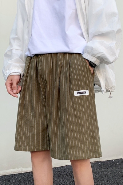 Triibulised 3/4 taskutega püksid