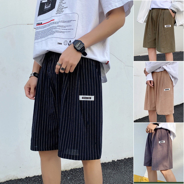 Triibulised 3/4 taskutega püksid