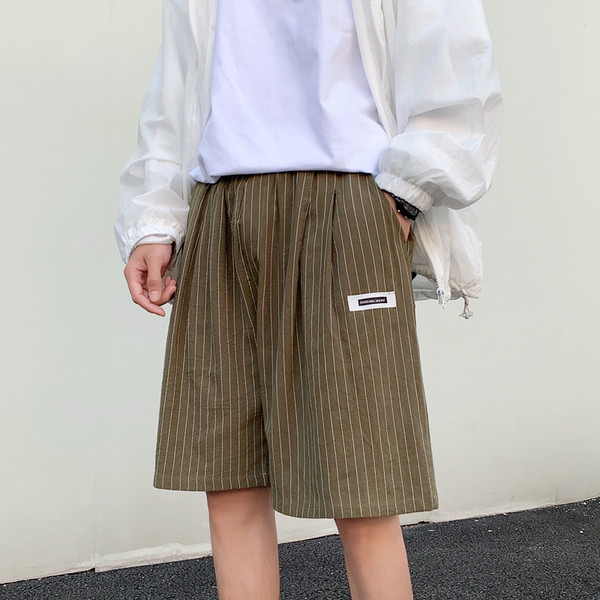 Triibulised 3/4 taskutega püksid